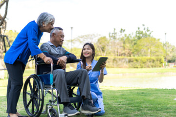 Portrait of smiling caring asian nurse service help support discussing and consulting taking care with senior elderly asian man and woman couple at home visit.senior retirement home care concept