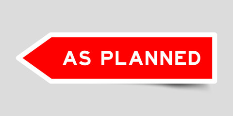 Red color arrow shape sticker label with word as planned on gray background