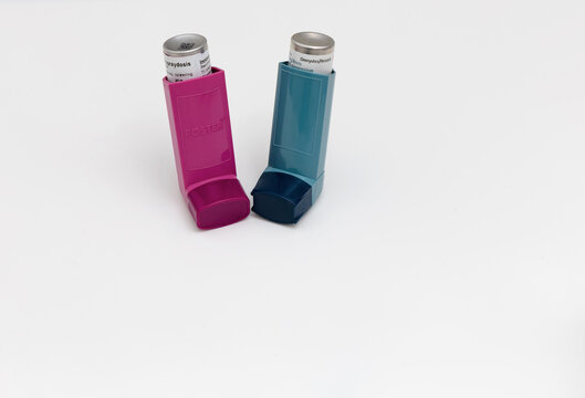 Asthma medications inhalers Ventoline and Innovair on a white background.