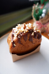 hazelnut praline new york roll with caramel and chocolate sauce