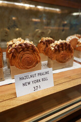 hazelnut praline new york roll with caramel and chocolate sauce