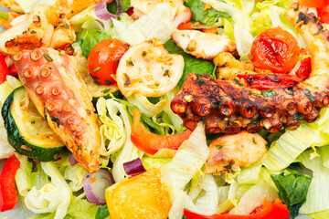 Octopus salad with raw vegetables.