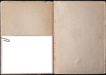 A vintage book page with blank photo frame attached with paper clips. - 624418405