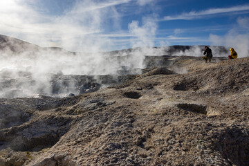 Stunning geothermic field of Sol de Mañana with its steaming geysers and hot pools with bubbling mud - just one sight on the lagoon route in Bolivia, South America