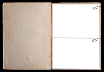 A vintage book page with blank photo frames attached with paper clips.