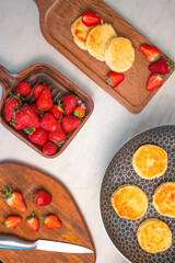 Breakfast. Freshly cooked cottage cheese pancakes with fresh strawberries. Flat lay