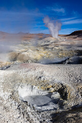 Stunning geothermic field of Sol de Mañana with its steaming geysers and hot pools with bubbling mud - just one sight on the lagoon route in Bolivia, South America