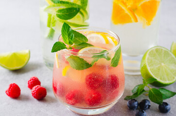 Summer Drinks Set, Fruit, Citrus and Berry Refreshing Lemonade or Cocktails on Bright Background