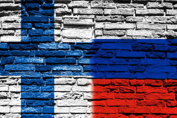 Background with flag of Finland and Russia on brick wall