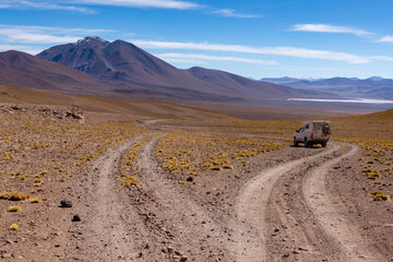 Living the adventure dream: driving the scenic lagoon route through the remote Fauna Andina Eduardo Avaroa National Reserve in the Bolivian Altiplano  South America © freedom_wanted
