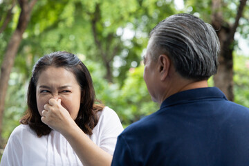 Senior Asian Couple, Unpleasant Breath Problem and Disgust Concept - obrazy, fototapety, plakaty