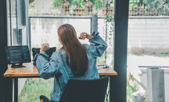 Female programmers are stretching oneself and relaxing after working and planning to work on programming, software coding and web design. Concept technology development.
