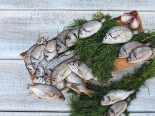 Fish on a wooden table, Laskur, Denys, Spartan fish, sea fish, seafood, small silver fish, top view, background image for presentations, place for text