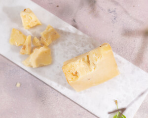Top view of pieces of hard cheese