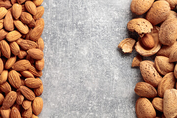 Almonds on a stone background.