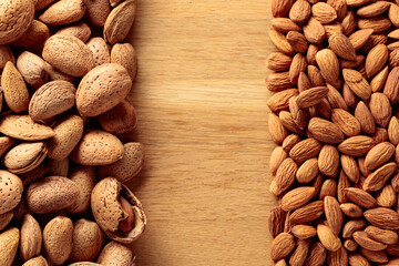 Almonds on a wooden background.