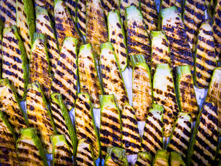Grilled Zucchini with Garlic is side dish recipe in party or get-together. Continental recipe is seasoned with virgin olive oil, garlic and further garnished with thyme sprigs.