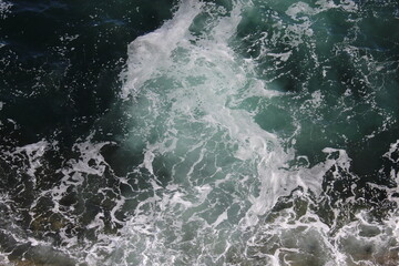 Fototapeta na wymiar Churning Water from Receding Wave