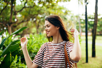 woman park freedom smiling walk beautiful nature meditation t-shirt summer lifestyle