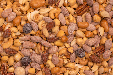 A group of almonds, pistachios, walnuts, macadamia, cashews.