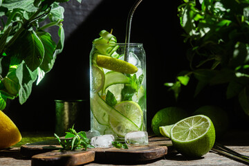 Cold lemonade with lime and cucumber .Cocktail