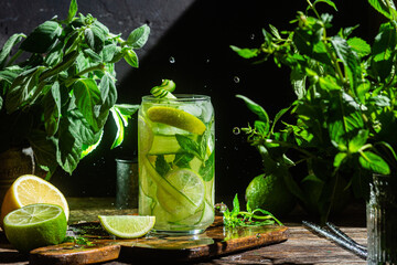 Cold lemonade with lime and cucumber .Cocktail