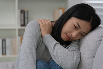 Depression and mental illness. Asian woman disappointed, sad after receiving bad news. Stressed girl confused with unhappy problems, arguing with boyfriend, cry and worry about unexpected pregnancy.