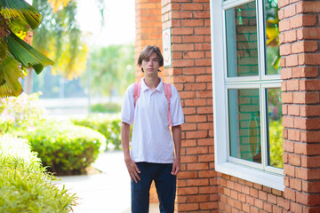 Kids back to school. Happy student with backpack.