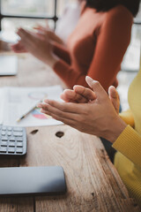 Fototapeta premium Group businessman attended a meeting with executives of startup companies, startup company sales team meetings, brainstorming and summary of company performance. Business strategy management concept.