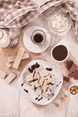 Neapolitan wafers filling with hazelnut-chocolate cream. - 624462045
