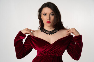 elegant luxury woman in evening dress posing on white background