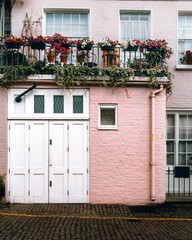 A cute house decorated with lots of flowers