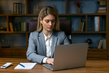 Confident serious experienced qualified beautiful smart woman wi