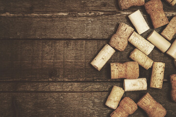 Fototapeta na wymiar Heap of vintage wine corks on wooden table