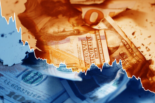 USD bills with overlayed falling sparkline chart. Concept of economic crisis, inflation,  GDP negative growth
