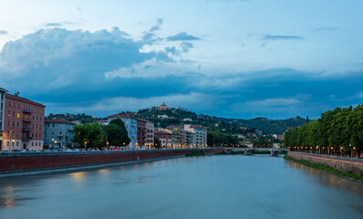 Fototapeta premium Evening panorama of Verona with the Mostana River Adige