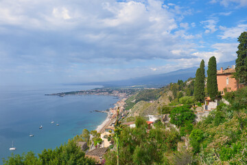 Obraz premium View of the blue sea from Taormina towards the bay in Giardini Naxos, Sicily, Italy