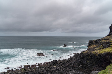 Sea coming in waves on the shore in the Azores of Portugal.