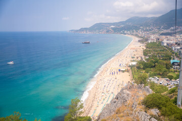 Fototapeta premium Aerial view of Cleopatra beach and Alanya from the cable car to Alanya castle, Turkey