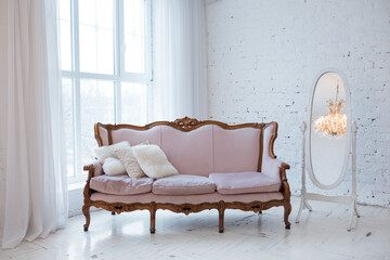 Vintage style sofa in loft interior room with big window. - 624499010