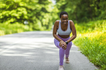 Black woman, stretching legs, fitness for exercise workout motivation or runner sports warm up. African woman, happy athlete and running wellness goal or cardio stretch in nature.