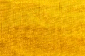 Fotobehang yellow fabric texture with subtle horizontal lines and variations close up © alexandr