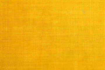 Textured yellow fabric close-up with a consistent pattern