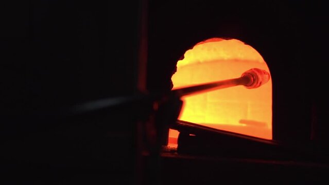 Rod with blown glass worked in the oven