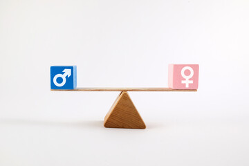 Gender equality concept. Male and female symbol on the scales with balance