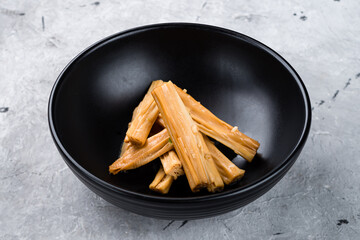 Fuju asparagus marinated in rice vinegar, garlic and sesame oil.