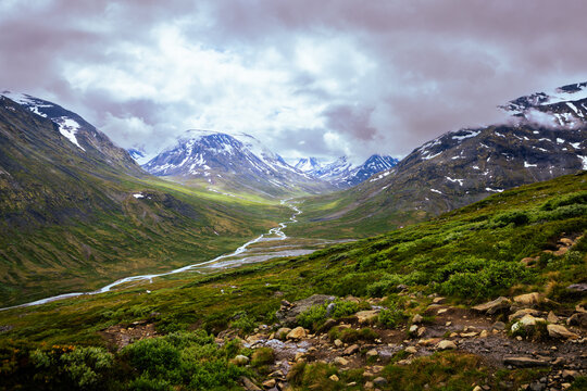 Galdhopiggen, Norway - July 3rd, 2023: The mountain landscape on the hike to the peak of Galdhopiggen In Jotunheimen National Park, Norway