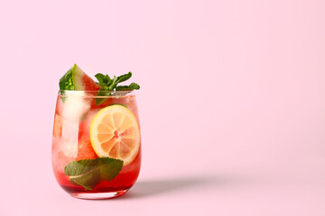 Glass of fresh watermelon lemonade with mint on pink background - obrazy, fototapety, plakaty