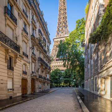 Street with Eiffel Tower view, Paris, France