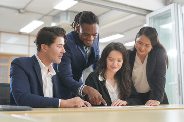 Business discussions. Shot of businesswomen brainstorming in an office.. young people group in modern office have team meeting and brainstorming